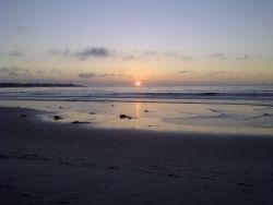 Spectacular beach sunsets are only a 5-minute walk from SeaBreak Cottage!