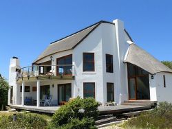 View of house which faces the ocean, from our beach gate with direct access to dunes and beach