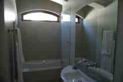 3rd full bathroom, en suite, bath with overhead shower, heated towel rails