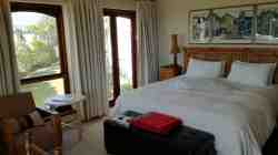 Main bedroom, extra length king-size bed, side opens to enclosed garden