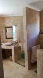 Main bedroom's full en suite bathroom, separate shower
