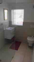 Bathroom with shower and solar geyser. Underfloor heating for wintertime.