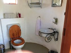 Hornbill Bush Bathroom - Covered toilet & Basin with outside shower.