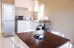 Kitchen dining and TV Area Unit 4