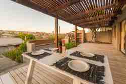 Downstairs Outdoors with dining table, built-in BBQ/Braai and Pizza Oven