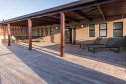 Top Floor balcony with seating and sunloungers