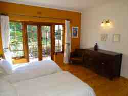 Two singles room with cot in semi seperate room