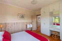 Main bedroom with built in cupboard