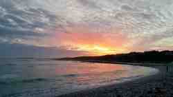 Sunset over the pebble bay.