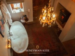 Honeymoon Suite Bathroom with Fireplace
