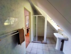 One bedroom apartment bathroom with shower
