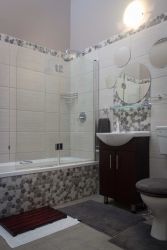 Shared Bathroom - Wooden Chest & Tin Cup