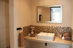 Basin in bathroom of King Room