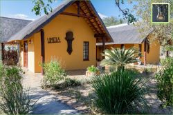Bushvilla Umoja Kruger -  Wildlife without fences. Maison vue du double abri voiture.
A louer comme gÍte ou avec petit-dejeuner, nettoyage tous les jours ** (Covid: pas de petit déjeuner et le nettoyage après 4 jours et sur rendez-vous pourque vous n'êtes pas dans la maison). 