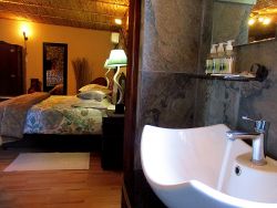 Stylish En-suite Bathroom with Luxury Bath and Glass Shower.
