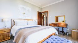 Main bedroom with Queen bed and sea views