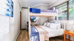 Bunk bed room with garden views