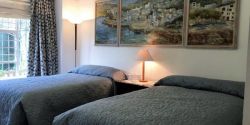 Bedroom 2 x 3/4 beds, microfibre duvets and pillows. A restful space.