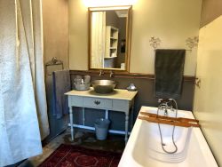 The Garden Suite has a large bathroom with bath