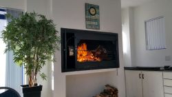 Indoor barbecue with access to garden