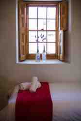 Cottage 2 - Second bedroom with double bed and single bed