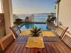 Alfresco dining and braaing right at the pool