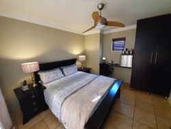 Superior room layout with mini bar and coffee/tee station.