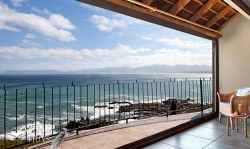 Slide open the doors and let the expanse of the ocean transport you to a place of quiet.