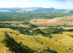 View from the mountain ridge towards the Escarpment and Wild Forest Inn at the foot of the mountain below