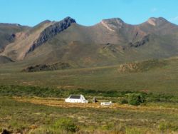 Many historic structures and ruins, including this historic homestead with the Pontiac doors (which is for sale). 